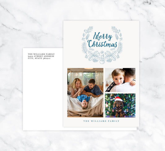 Blue Wreath Holiday Card Mockup; Holiday card with envelope and return address printed on it.