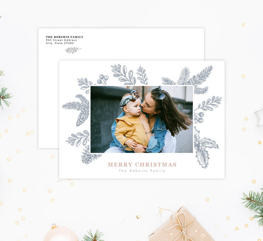 Christmas Frame Holiday Card Mockup; Holiday card with envelope and return address printed on it.
