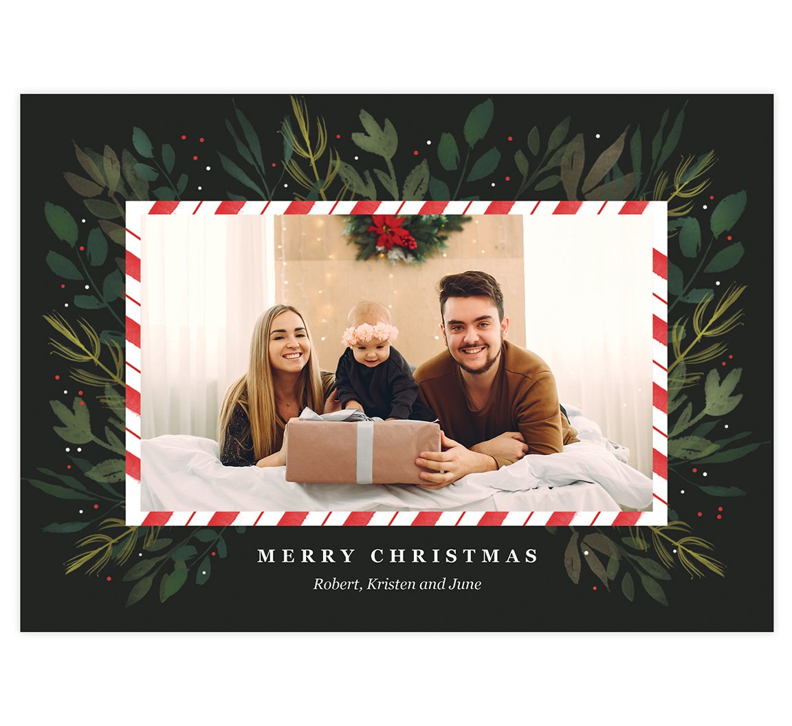 Candy Cane Frame Holiday Card; Dark backgrond, one image spot with a candy cane design frame around the image and watercolor greenery around the frame.