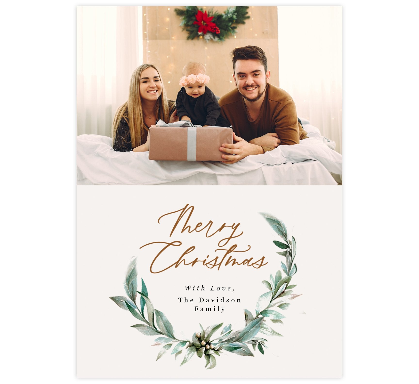 Christmas Wreath Holiday Card;  Features a watercolor wreath, subtle cream background, Christmas typography with a spot for a photo.