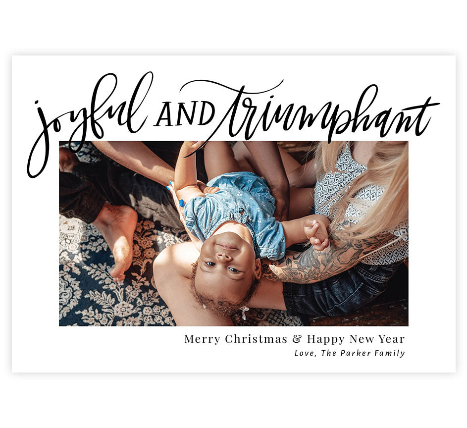 Joyful Holiday Card; one big rectangle image spot in the middle with "Joyful and Triumphant" in script along the top.