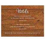 Load image into Gallery viewer, Rustic Glow wedding accommodations/details card; woodgrain background with white text

