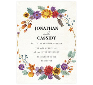 Colorful Floral Frame wedding invitation; textured background with colorful, circular floral frame and black text.