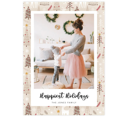 Woodland Holiday Card; Beige, tan and red pattern background with one large image spot and "happiest holidays" below the image.